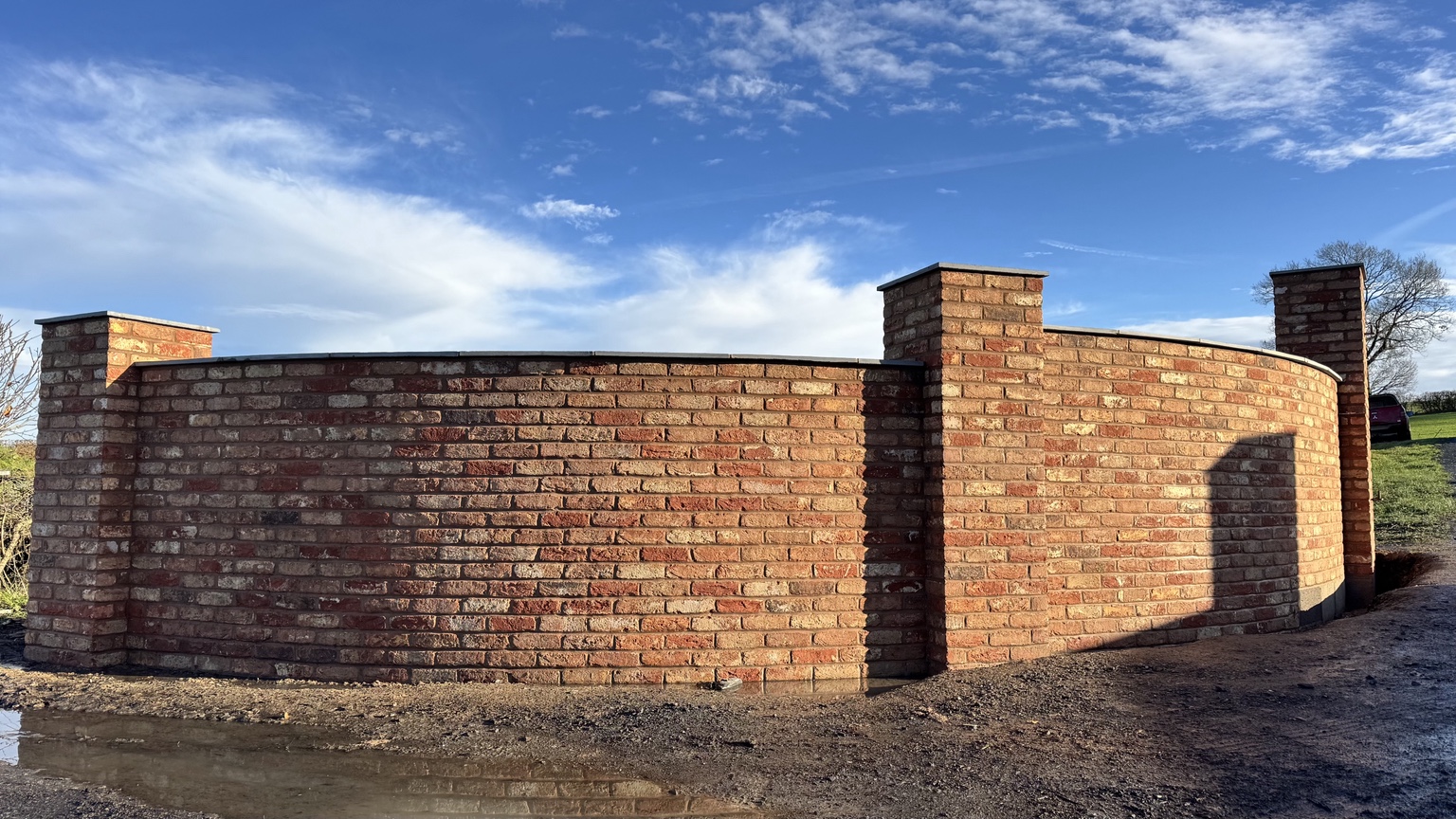 Completed curved brick entrance walls