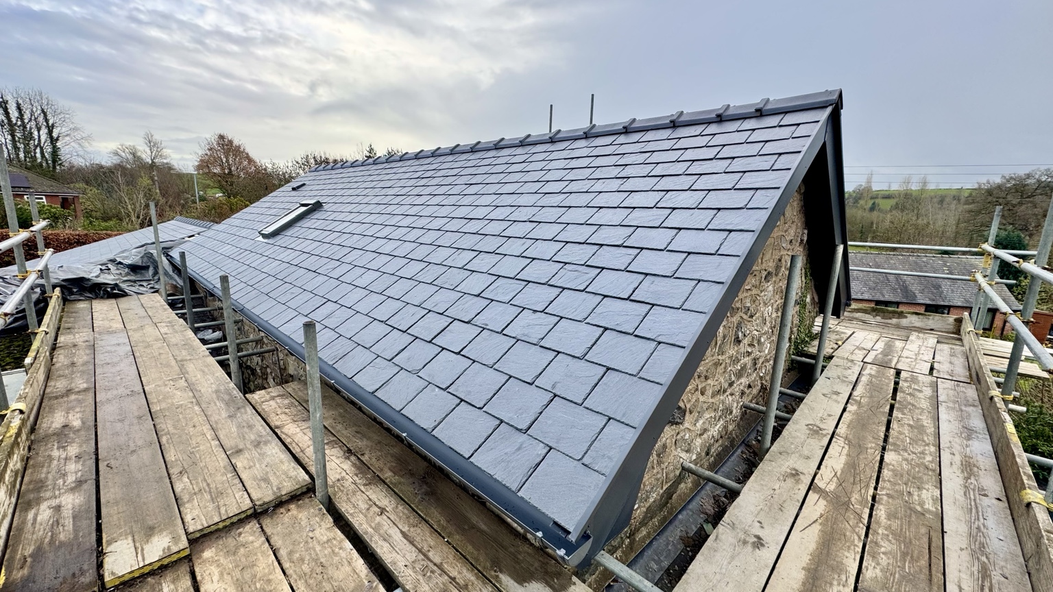 New slate roof completed across the cottage
