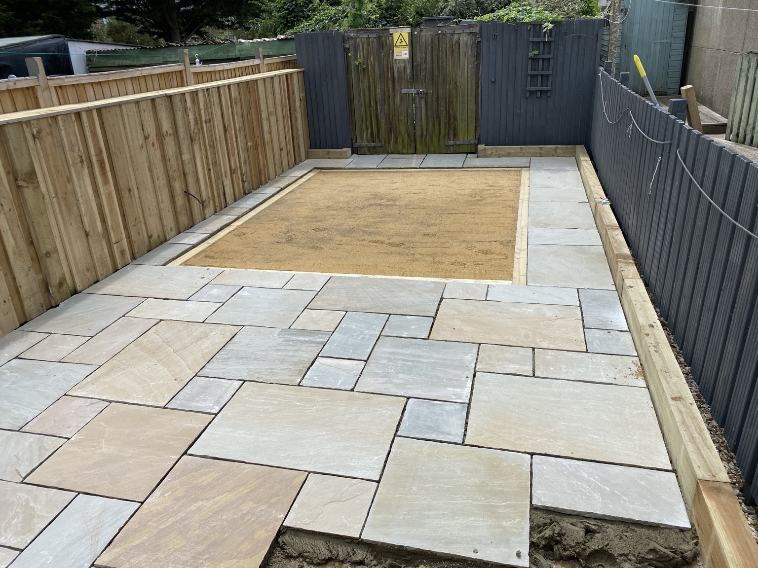 Indian sandstone patio during the laying stage