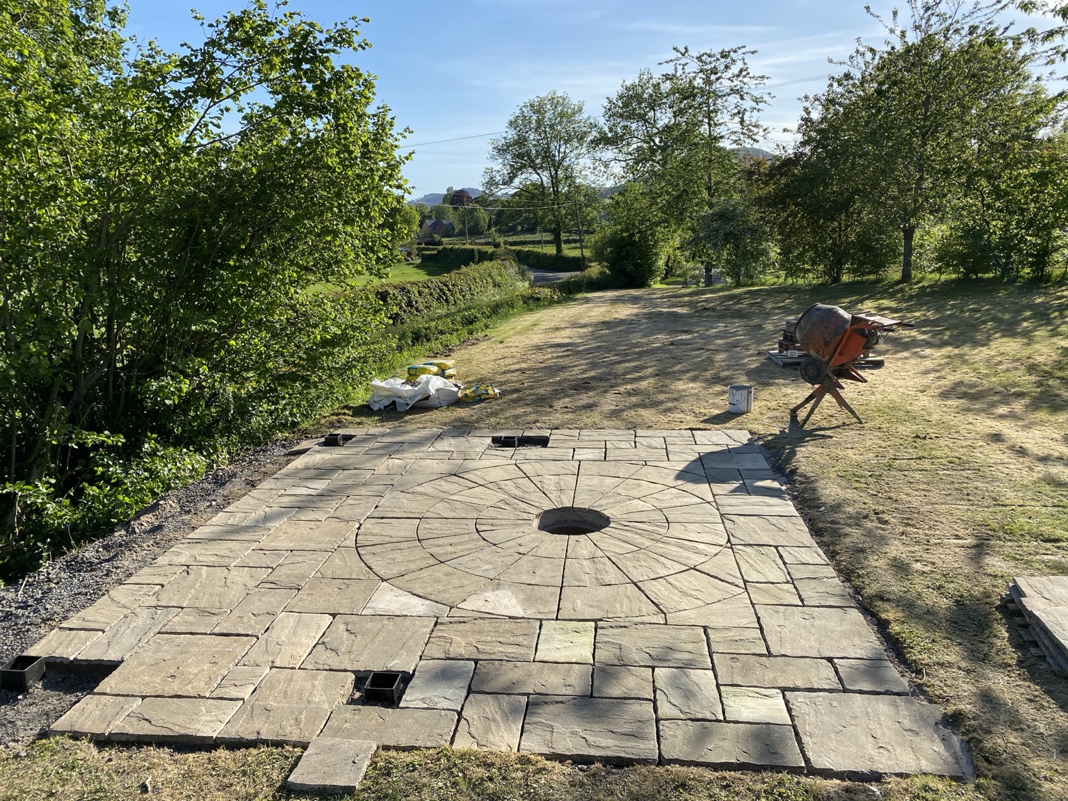 Overview of an Indian sandstone circular feature patio