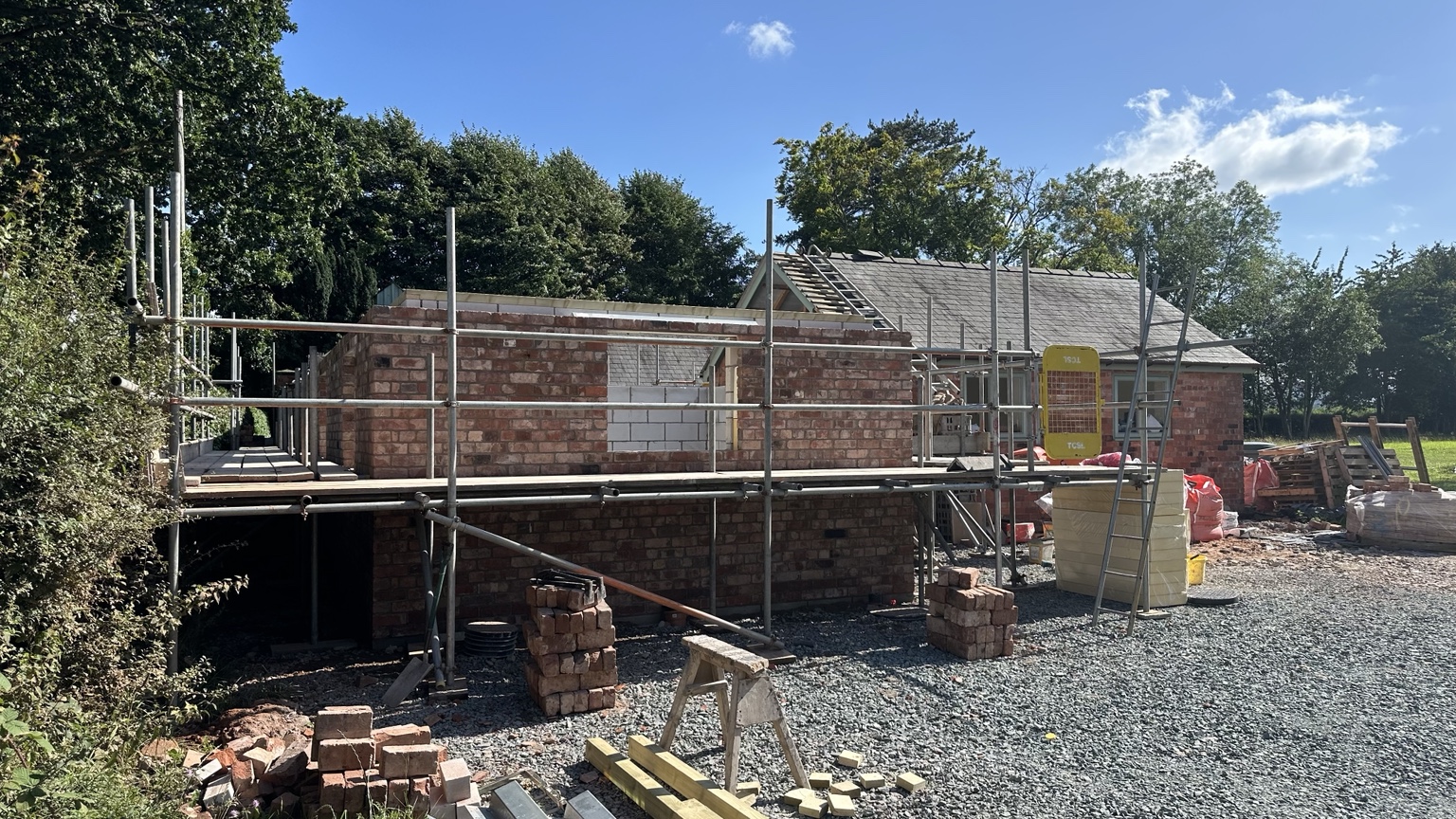Brick outer leaf and openings nearing wall plate level