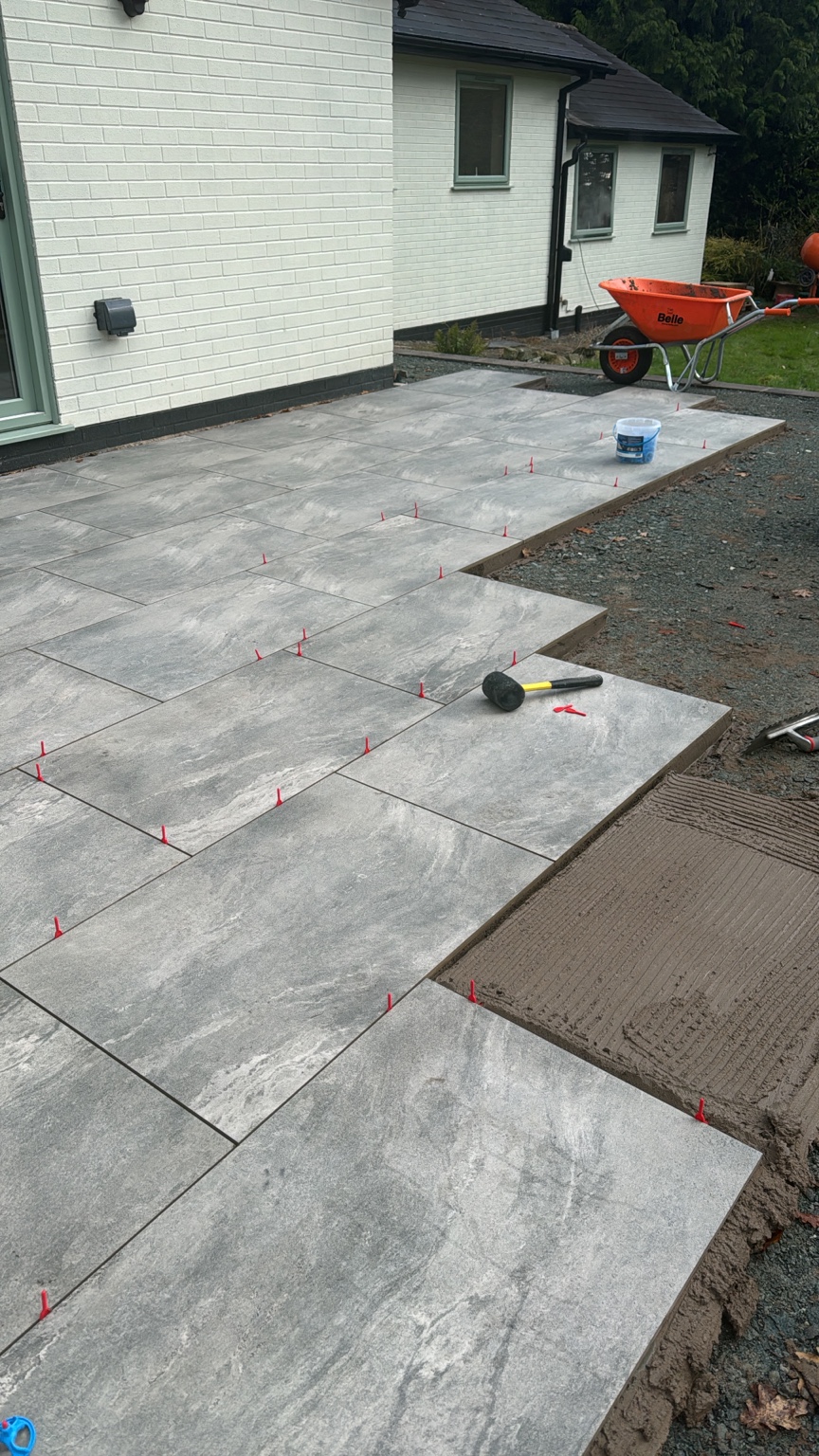 Large format porcelain slabs being laid